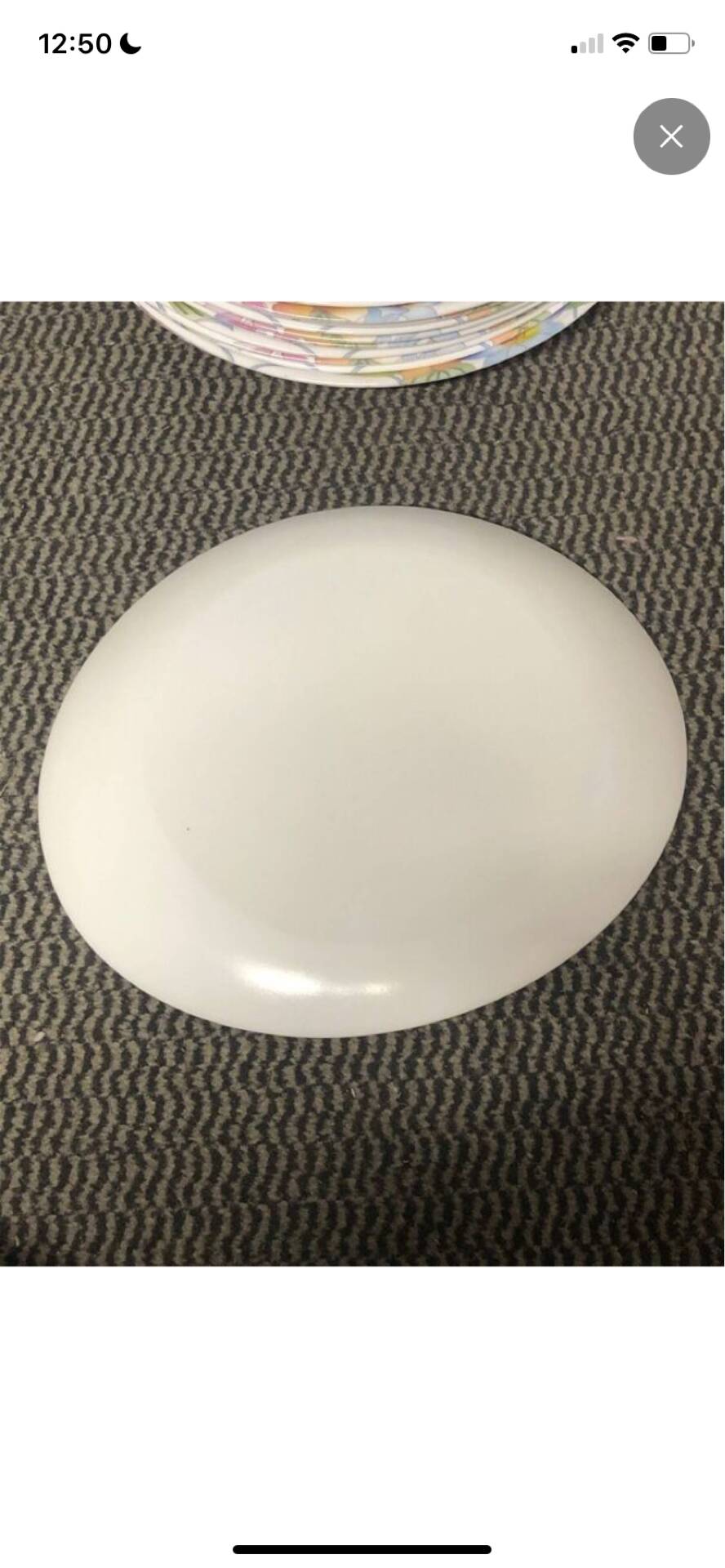 Set of 15 pastel floral patterned plates.