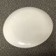 Set of 15 pastel floral patterned plates.