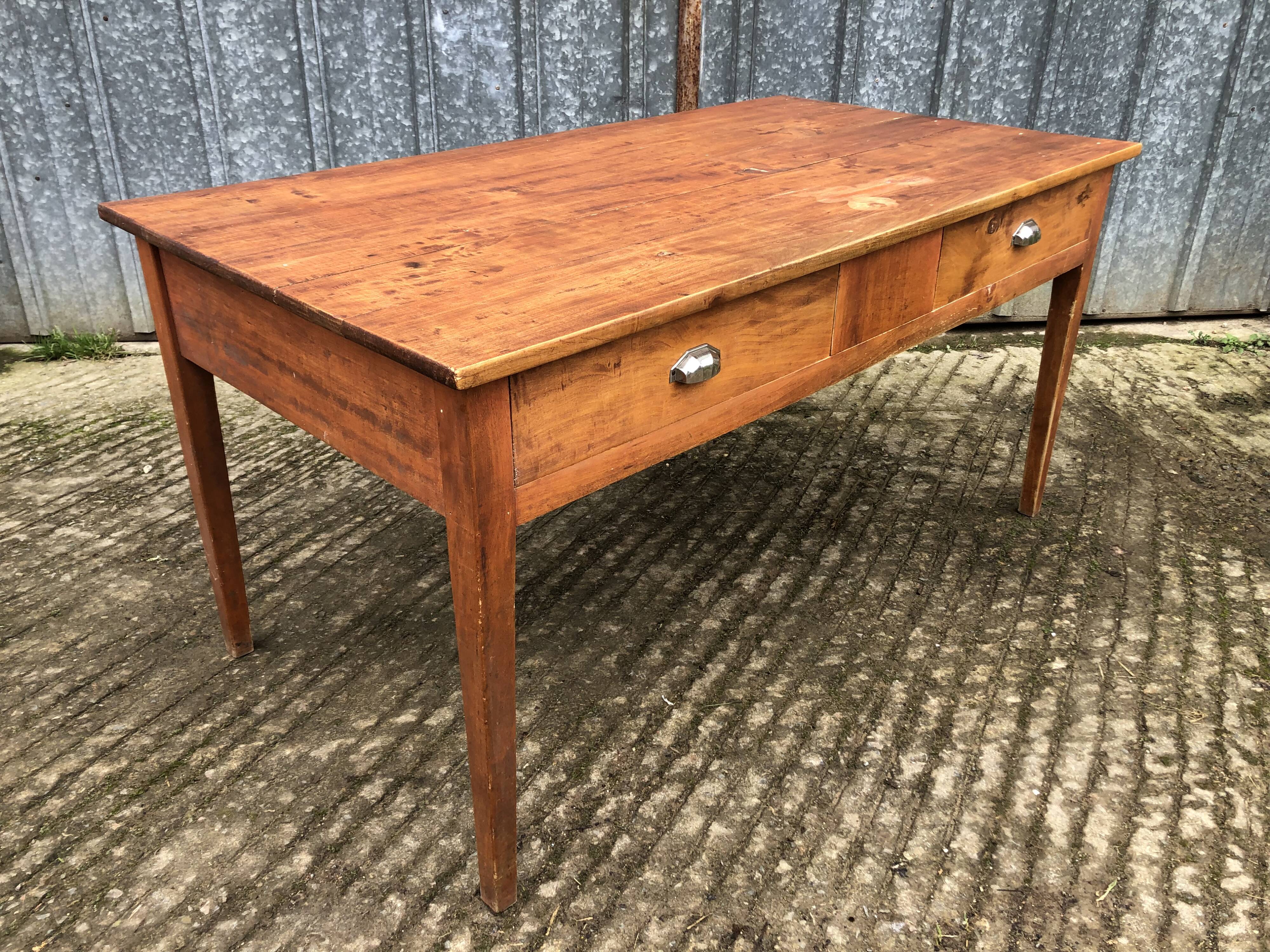 Poplar wood table with 2 front drawers from the Reconstruction period.