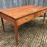 Poplar wood table with 2 front drawers from the Reconstruction period.