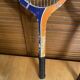 Pair of vintage wooden tennis rackets for cadet junior sport courier