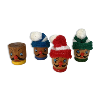 4 old wooden egg cups