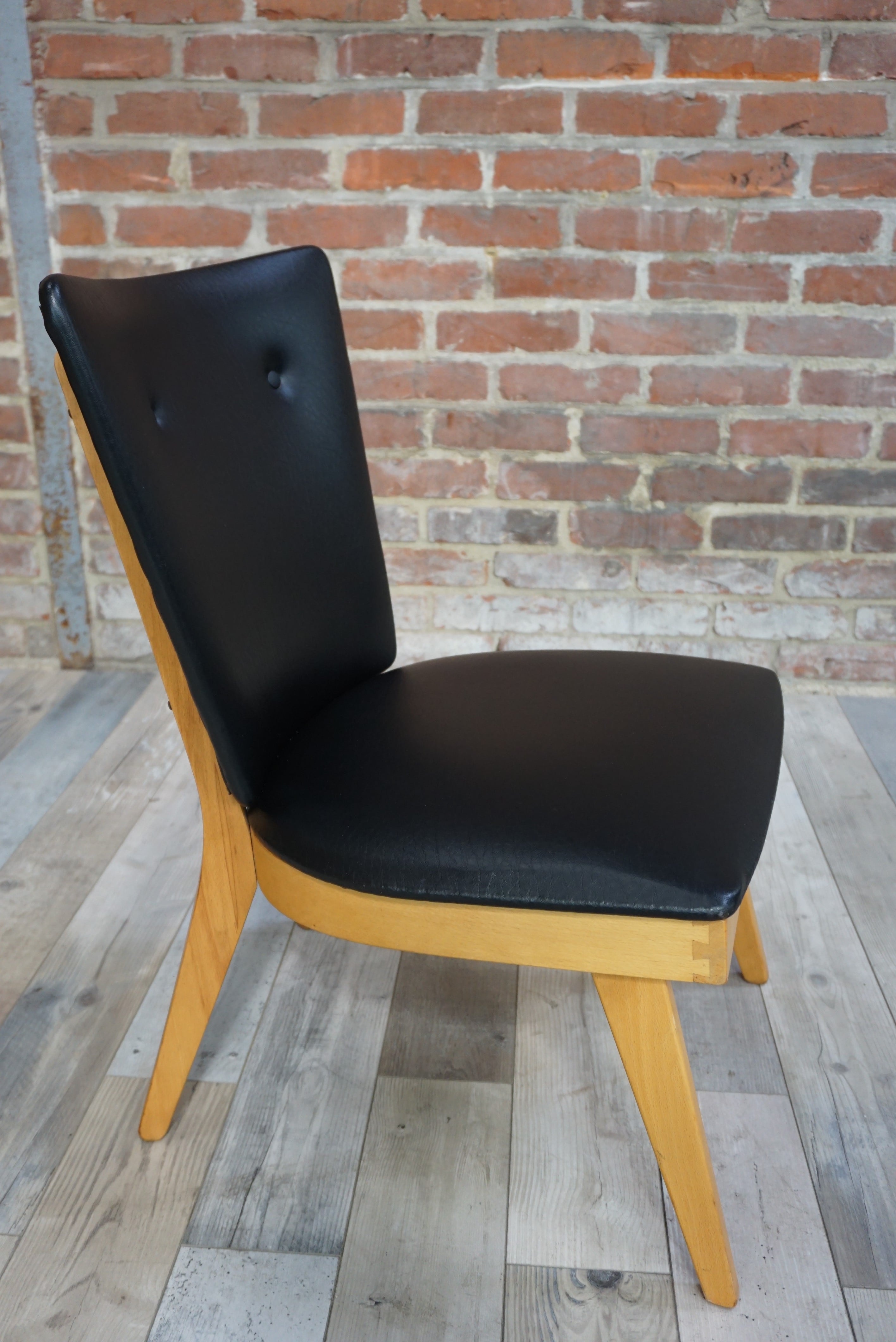 Chair 50 years in wood and faux black leather cocktail