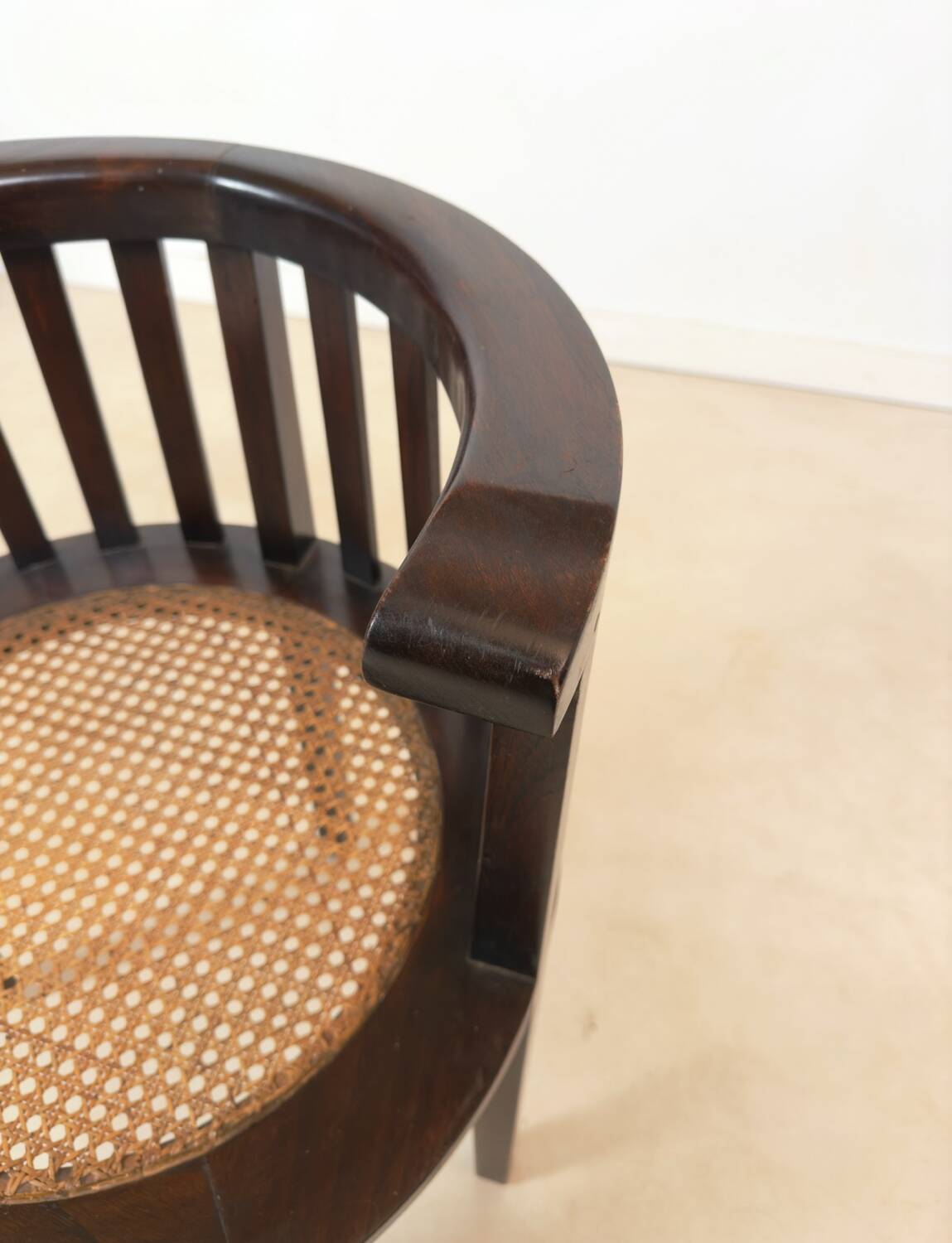 Colonial "Art Deco" armchair in wood and cane.