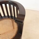 Colonial "Art Deco" armchair in wood and cane.