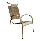 Woven metal armchair