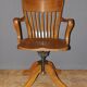 Rotating oak office chair circa 1930
