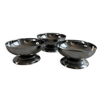 Set of 3 stainless steel dessert bowls on stands.