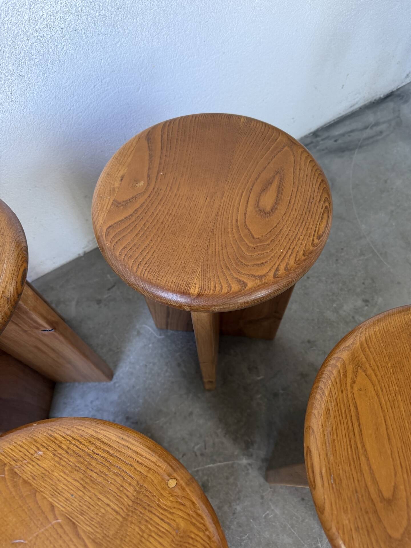 Set of 4 oak stools from the 1950s, constructivist style.