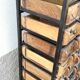 Black metal storage cabinet with 60 wooden drawers