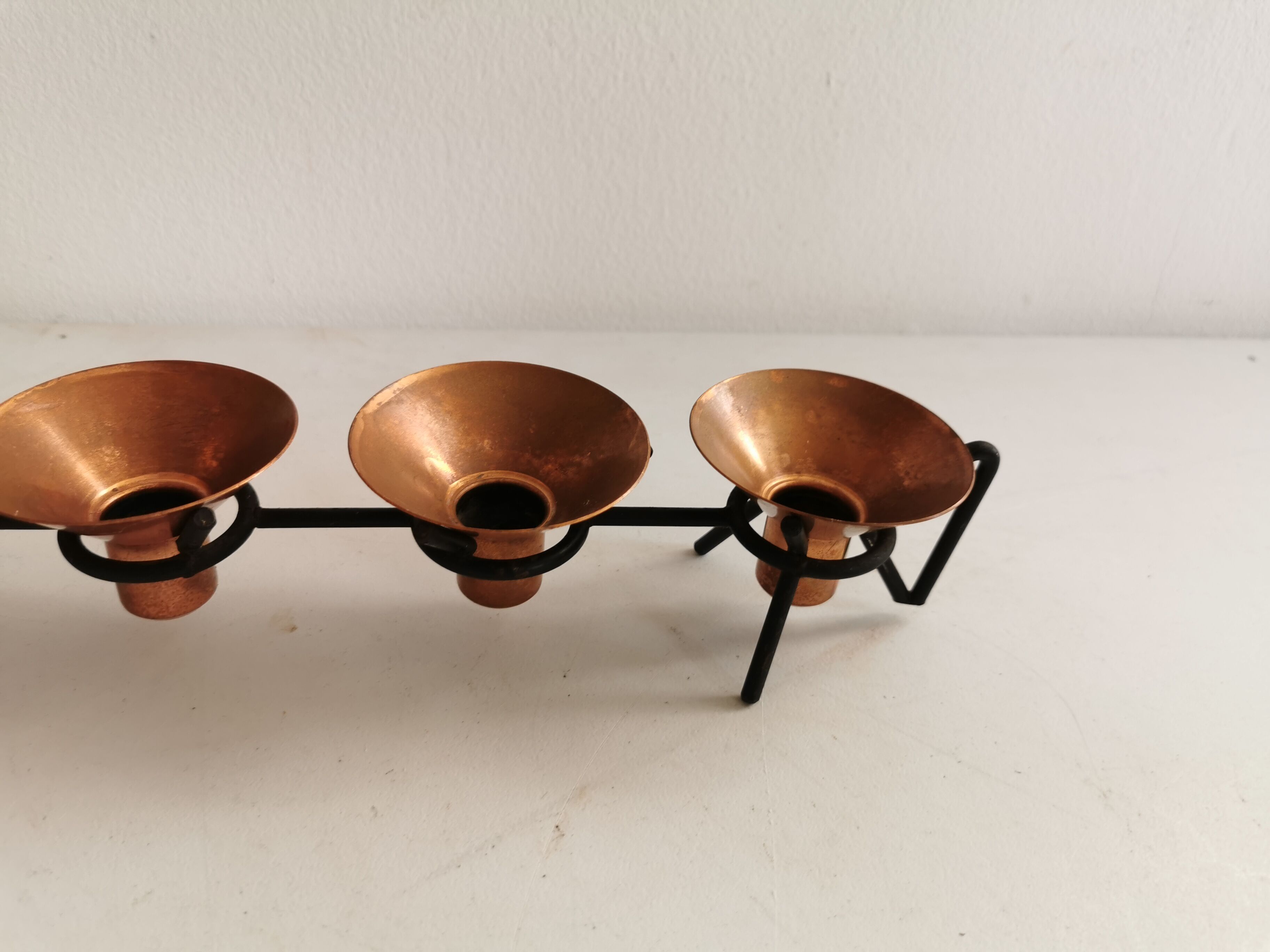 Older Danish designed candlestick, made of cast iron and copper.