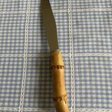 Bamboo handle cheese knife