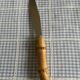 Bamboo handle cheese knife
