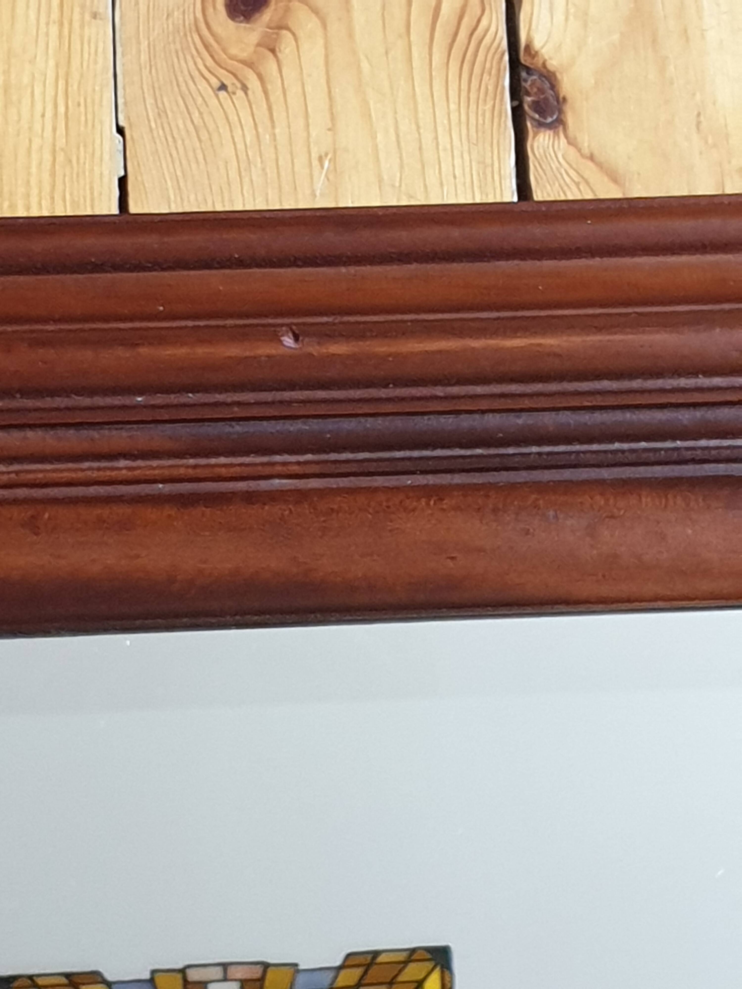 Large beveled mirror in cherry wood frame