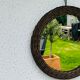 Vintage sun mirror in woven wicker