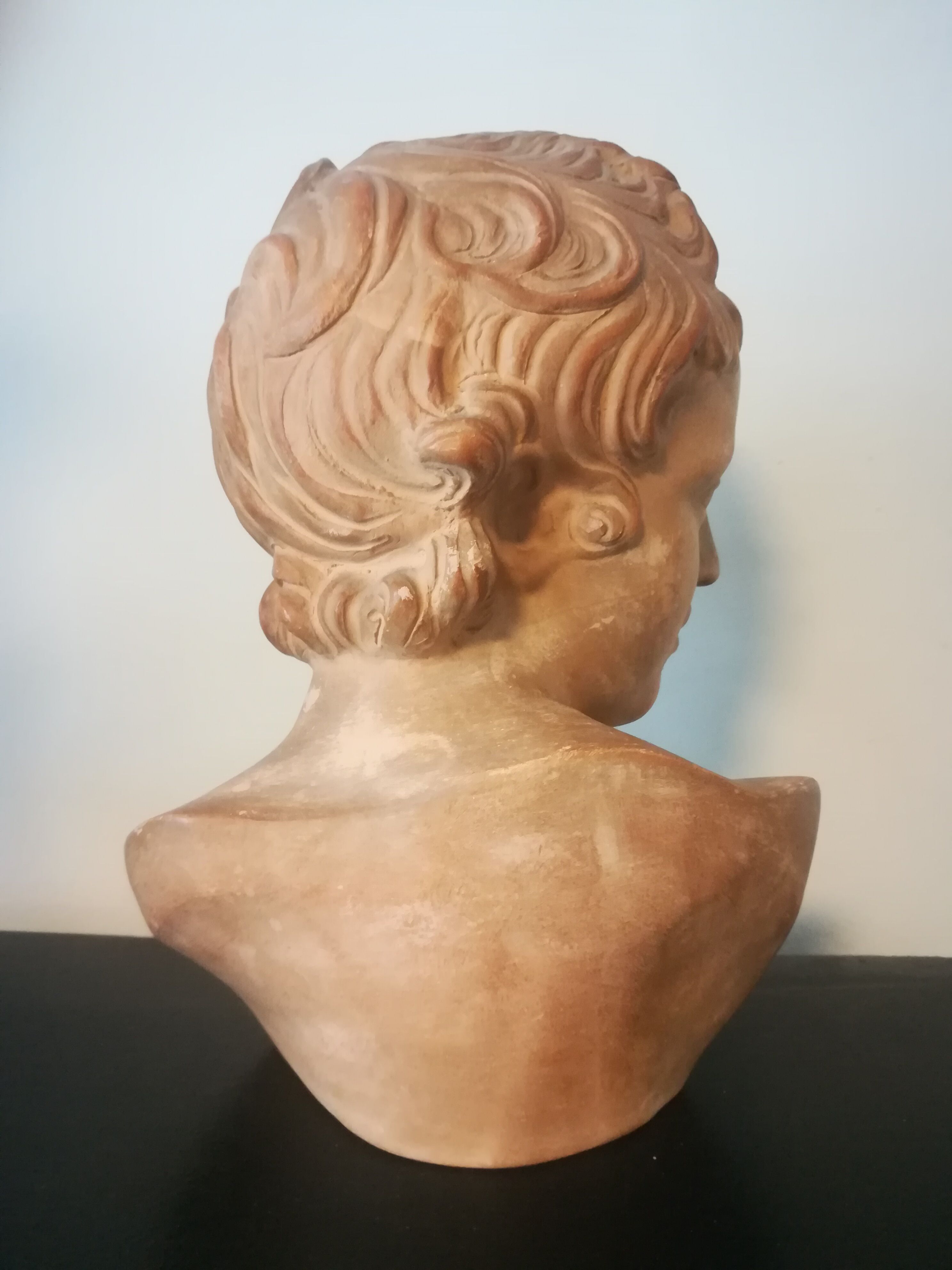Children's bust in terracotta
