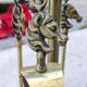 Serviteur de cheminé en bronze doré décor équestre, cheval