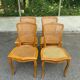 4 Louis XV dining chairs in light solid wood with caning.