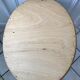 Grand miroir oval en stuc doré vintage