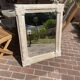 Carved mirror