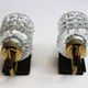 Pair of wall sconces in textured glass, wood, and gold metal, 1970.