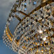 Chandelier cascade of tassels and brass