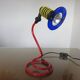 Spiral lamp in primary colours from the 80s Memphis era.