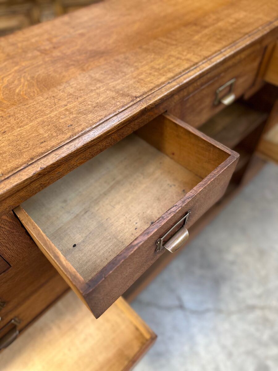Early 20th-century oak hardware counter