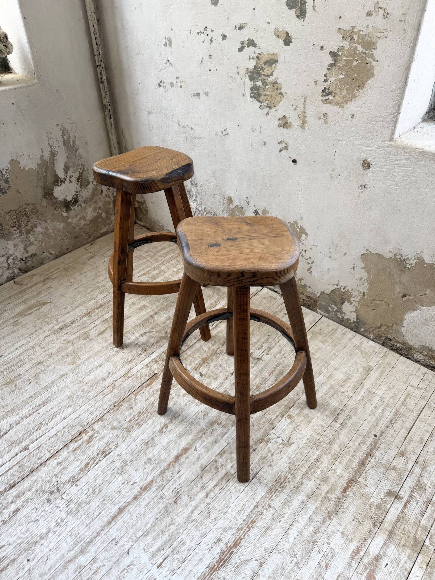 Pair of Henri Bataille stools in oak