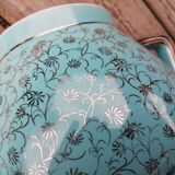 Semi blue teapot of silver flowers