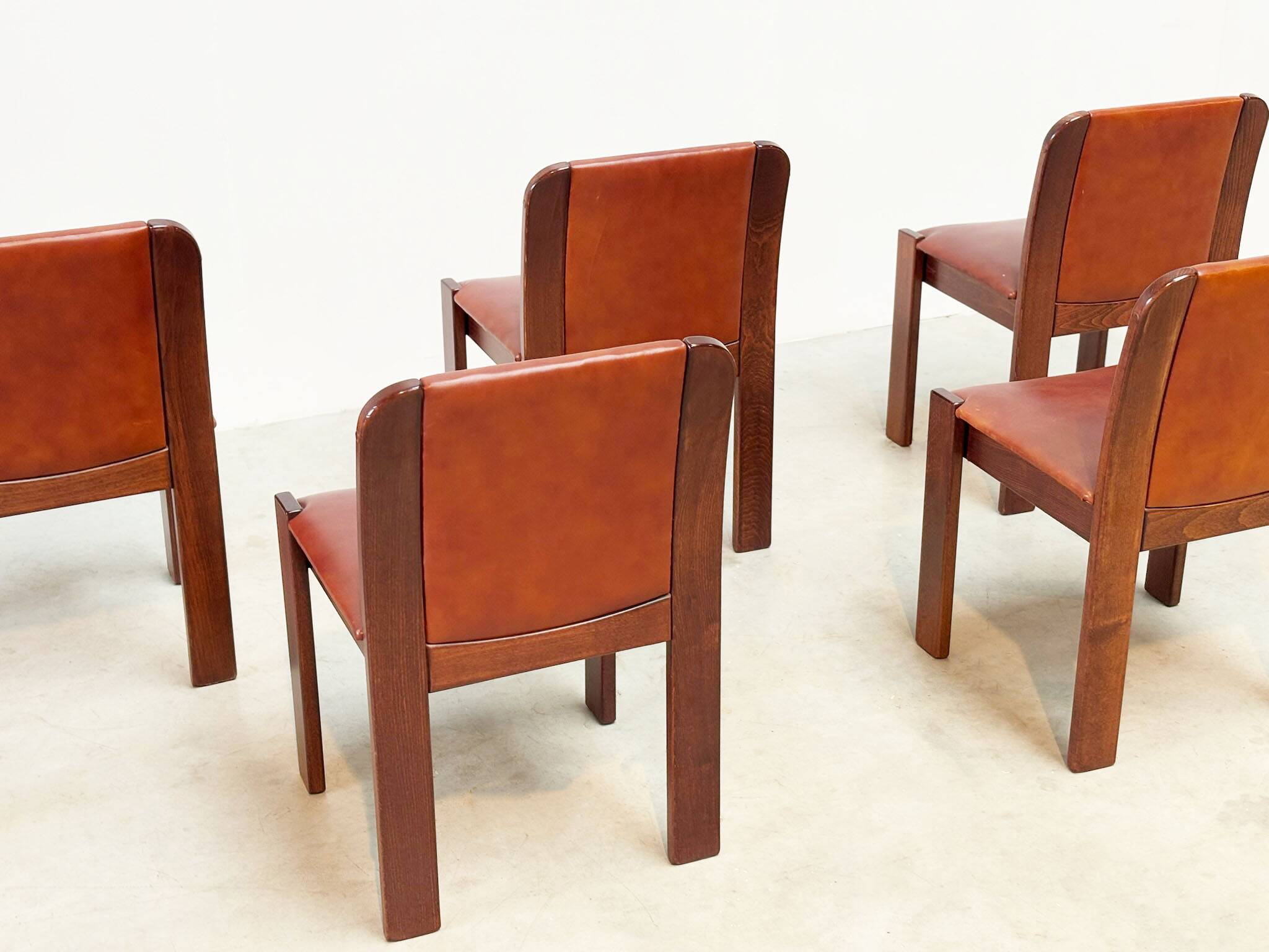 Set of six leather Italian dining chairs