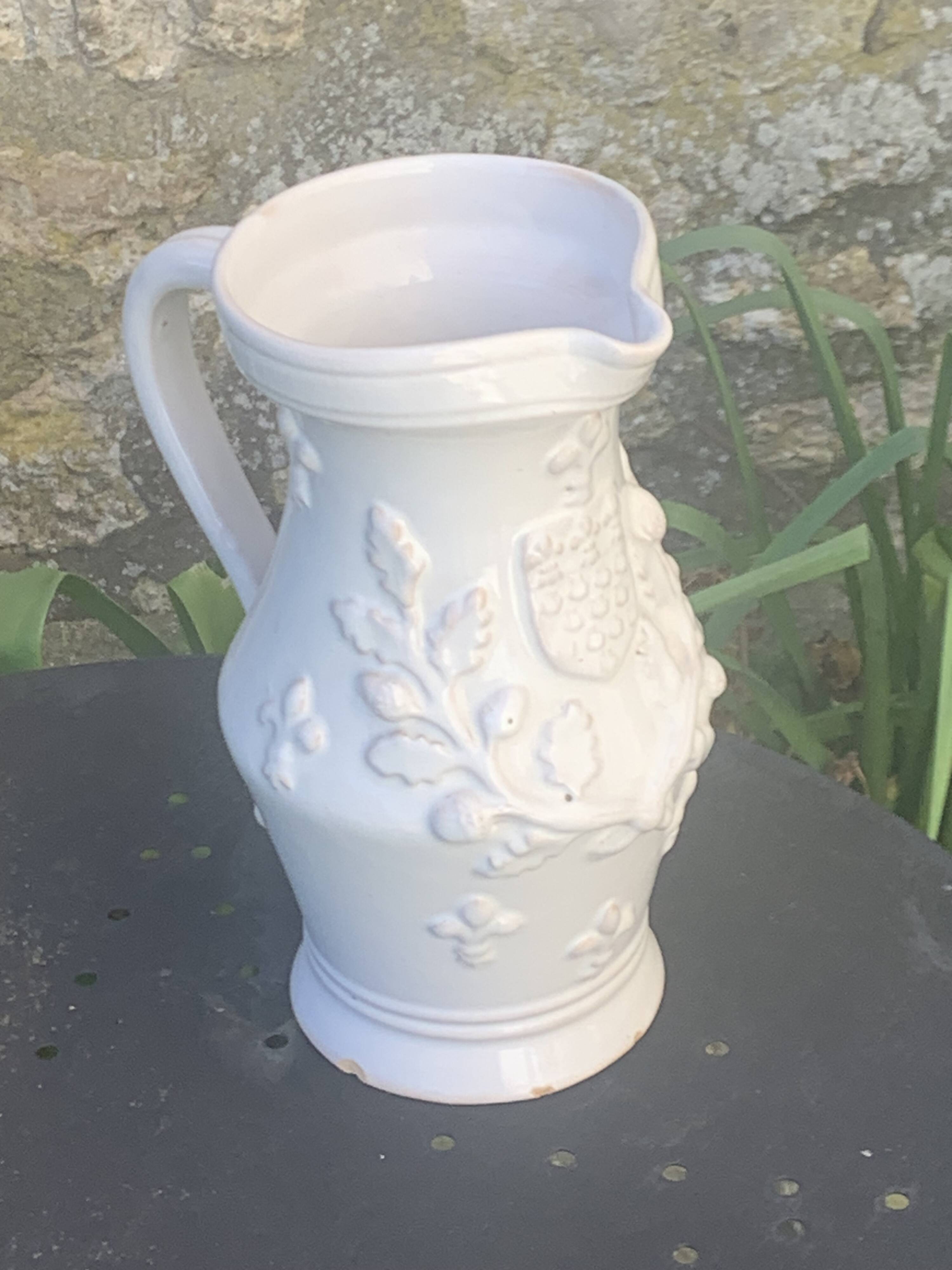 Carafe, pitcher signed Émile Tessier, Old France, in slip, ceramic