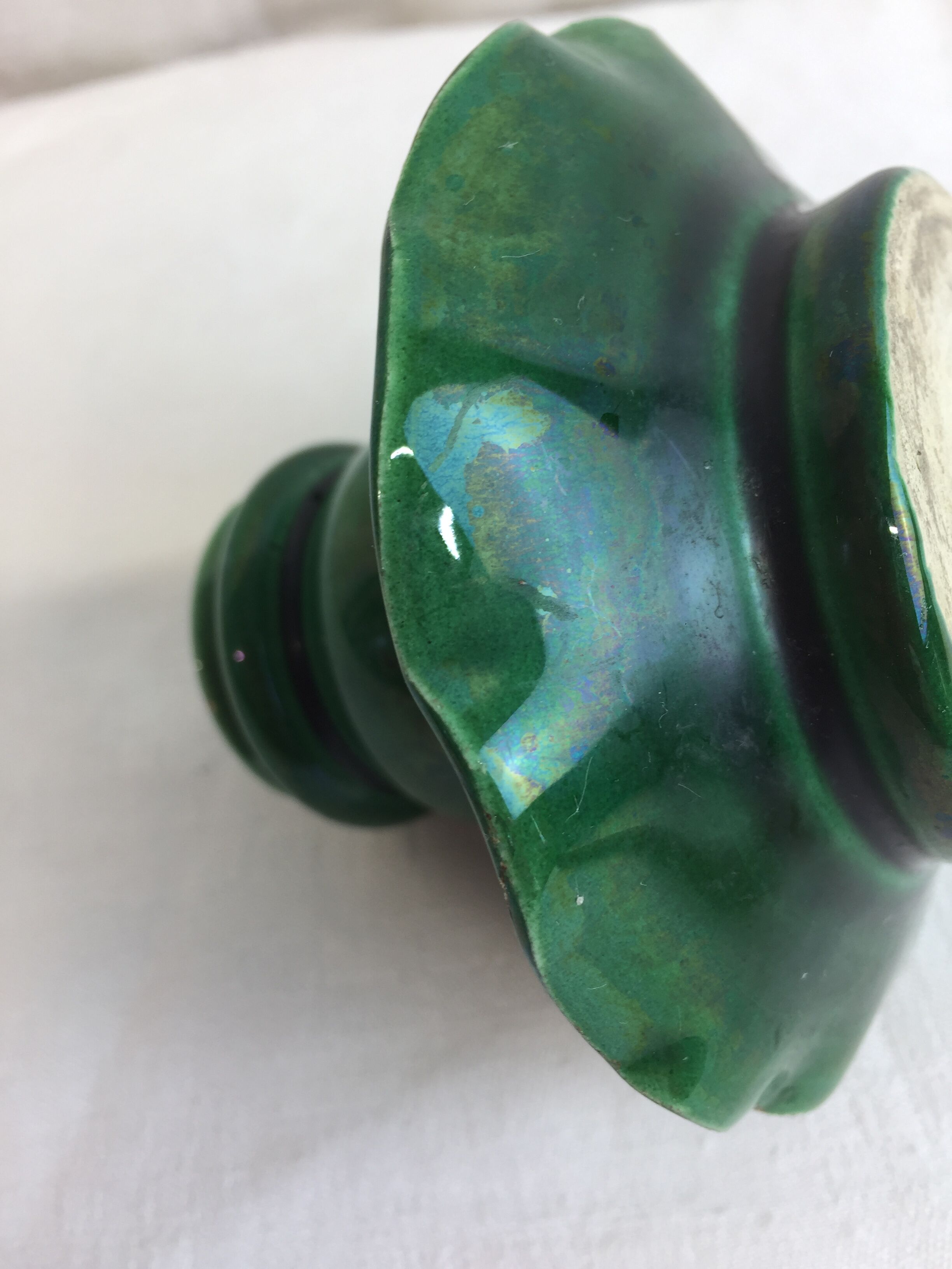 Old candleholder, glazed terracotta cellar, artisanal green color