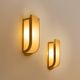Pair of modernist wall sconces in nickel-plated steel and opaline glass, 1930.