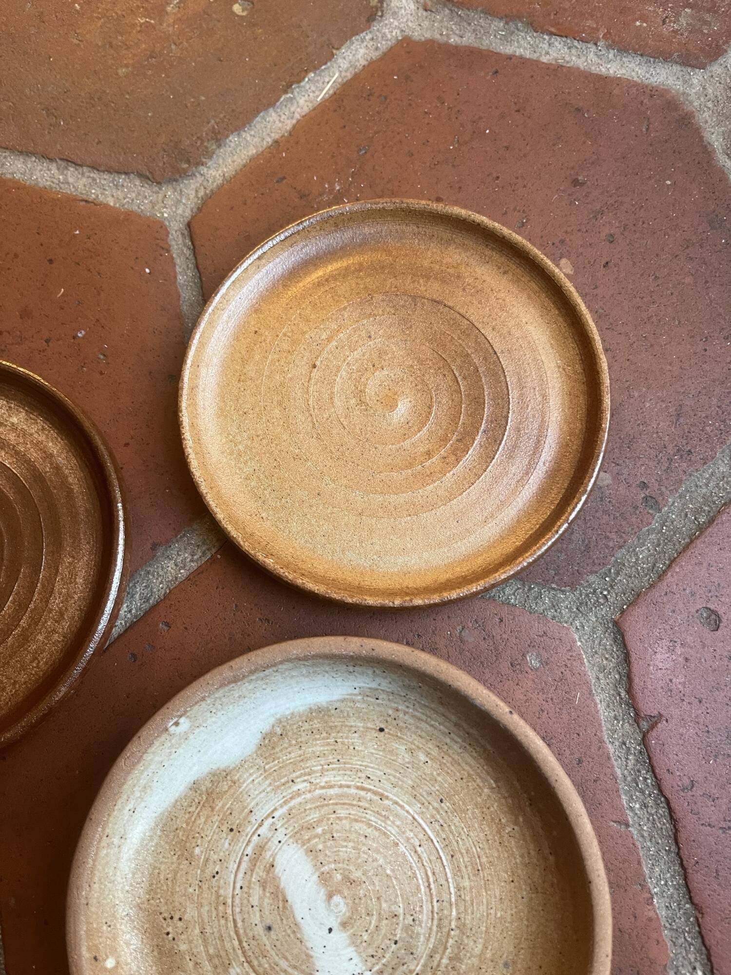 6 small stoneware plates