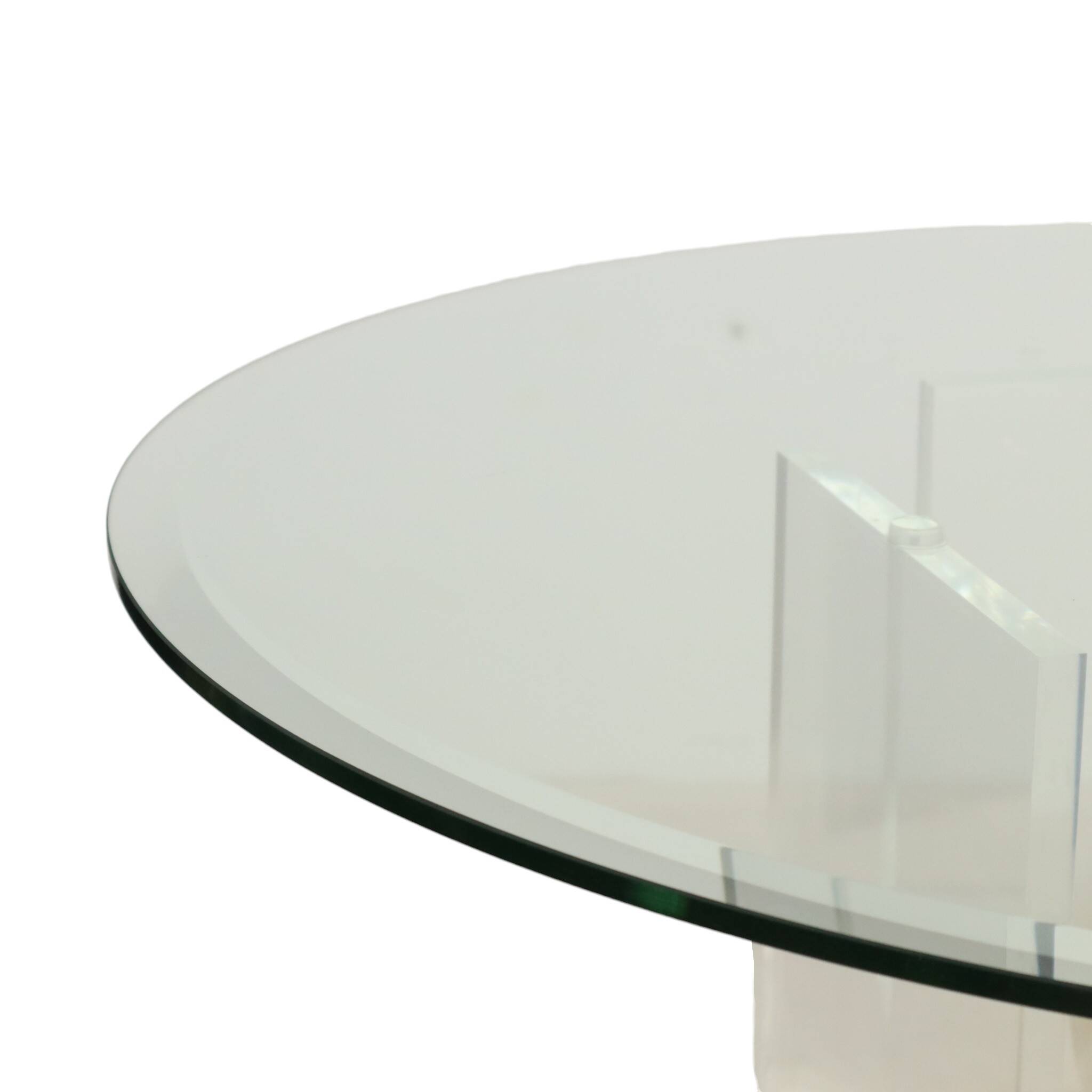 Vintage round coffee table in lucite and marbled glass.