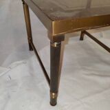 Small table or side table with brass structure and glass top from the 1970s.