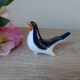 Vintage Soviet salt and pepper shaker in the shape of a cobalt blue bird.