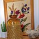 Artisanal blown amber glass vase with integrated honeycomb structure.