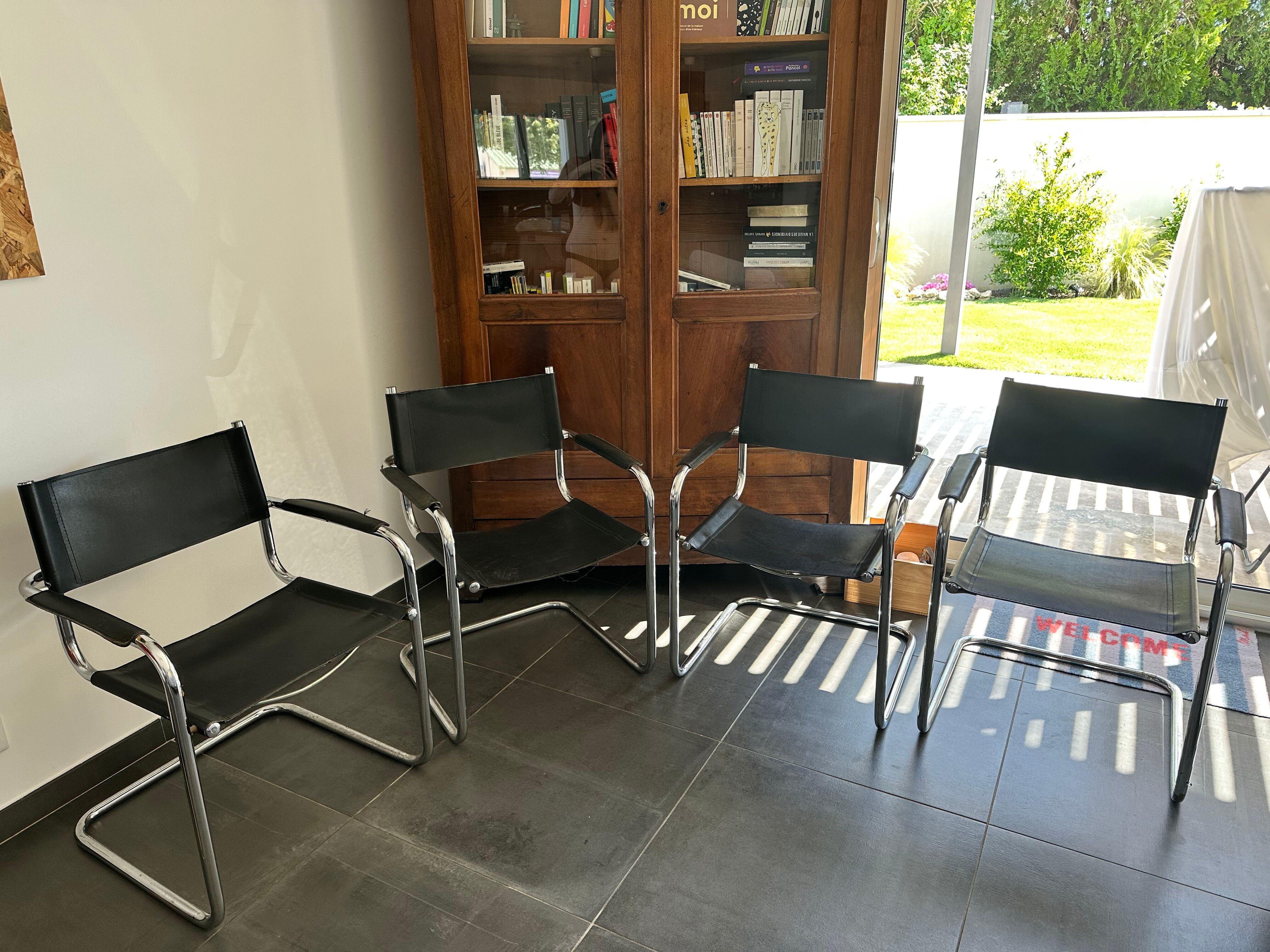 4 chrome tubular chairs