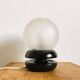 Petite lampe de table en bois noir avec globe en verre dépoli