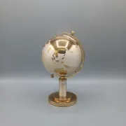 Vintage brass globe cigarette dispenser