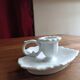 Night or hand-held porcelain candle holder in the shape of a leaf.