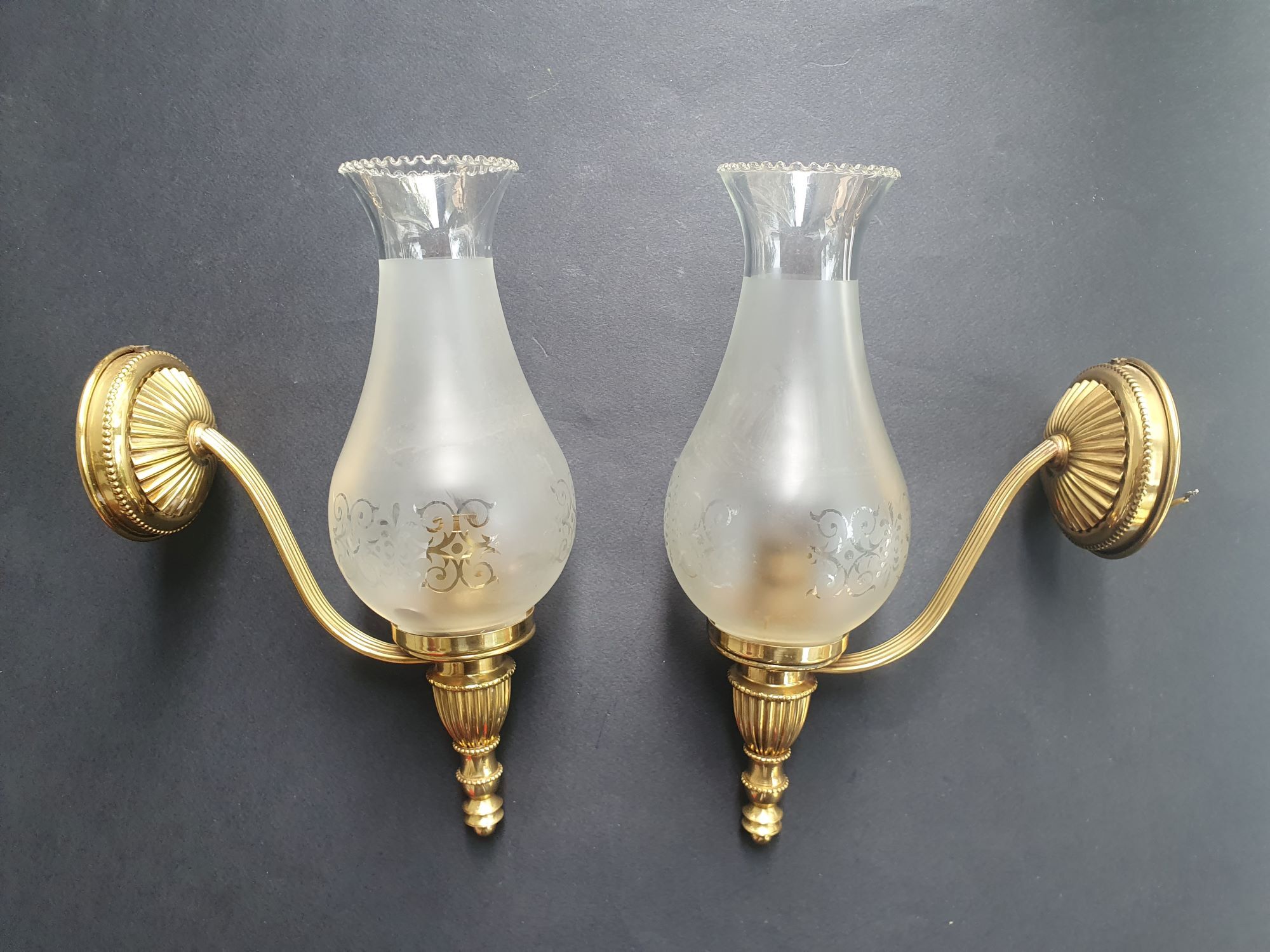 Pair of antique gold wall sconces