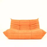 Togo sofa set and armchairs in pumpkin orange, 3 pieces, no label.