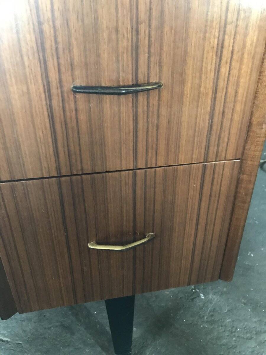 Mid-century hairdresser in brown teak and white with a mirror and brass legs.