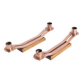 Pair of oak and copper bronze candlesticks