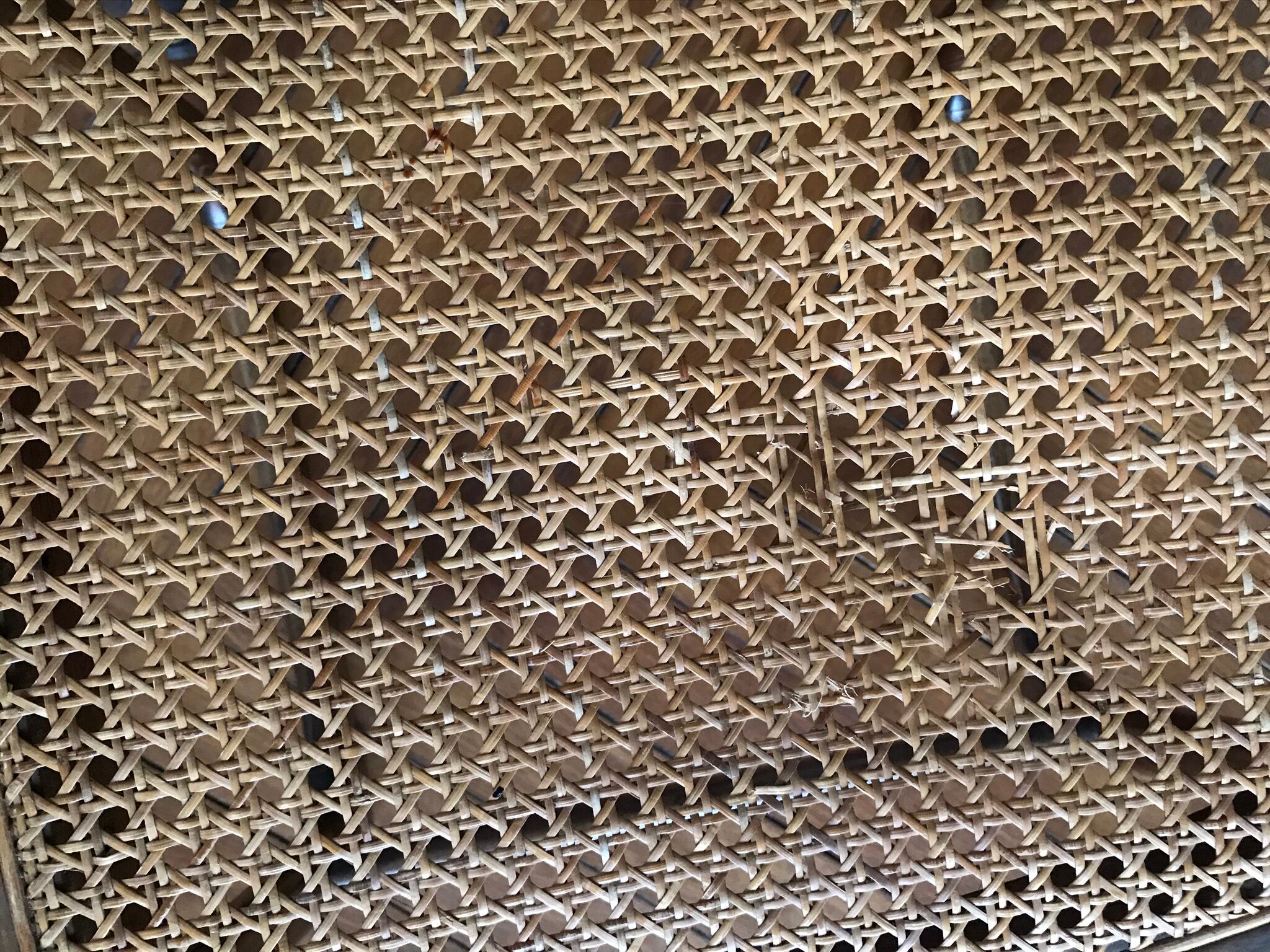 Series of 4 sleigh chairs in wicker, by Baumann