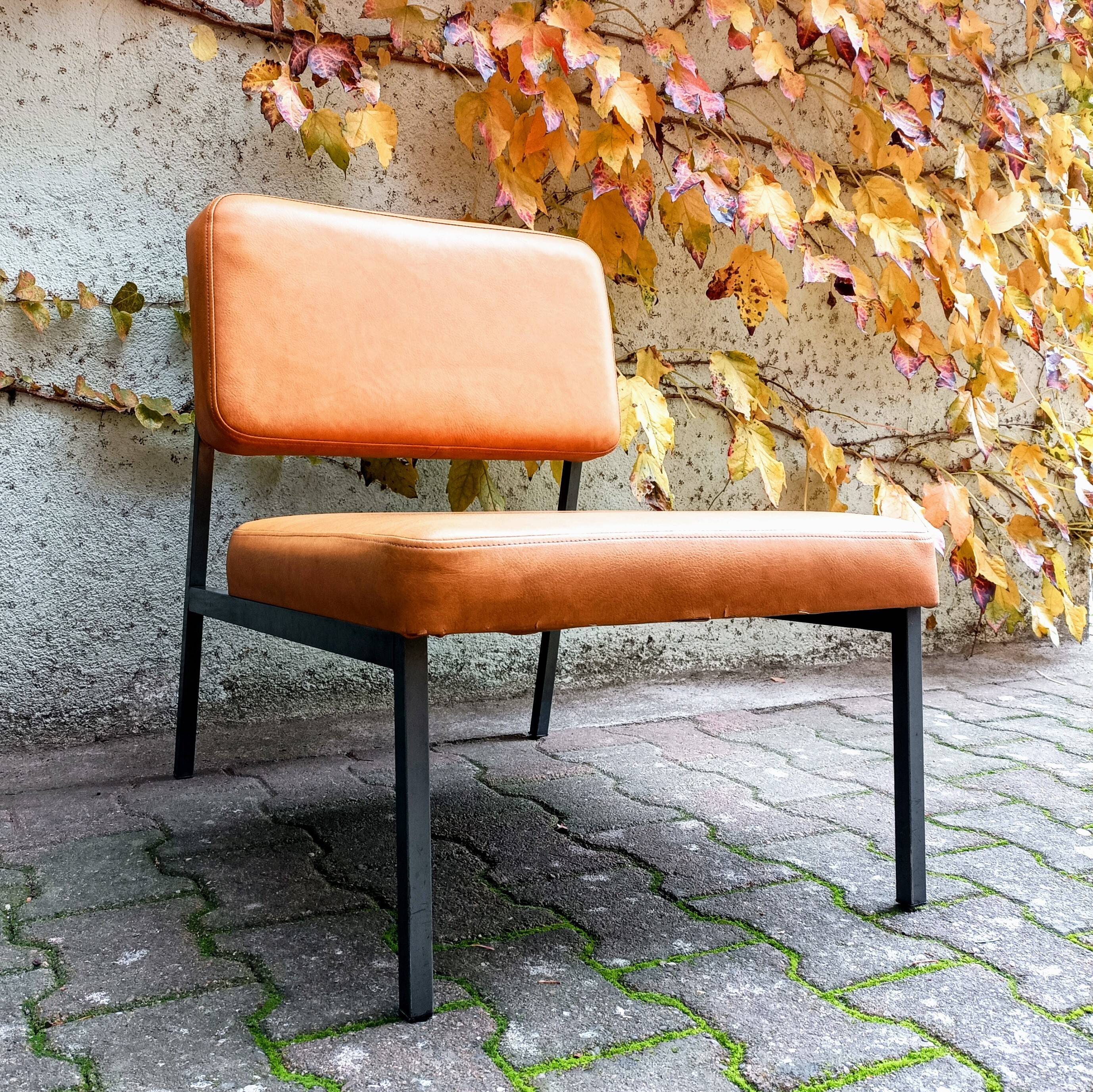 Modernist leatherette armchair