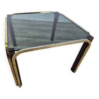 Coffee table in golden metal and smoked glass